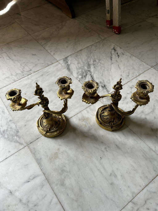 Beautiful antique chandeliers/candlesticks in bronze or gilded spelter, with refined floral rocaille decoration.