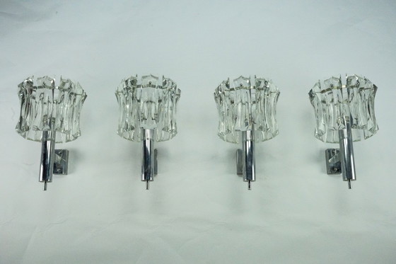 Image 1 of Ensemble de quatre grandes appliques en verre de Murano et en laiton chromé, Italie, années 1960.