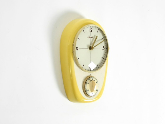 Image 1 of Beautiful battery-operated Mid-Century Modern wall clock by Mauthe with a glazed ceramic case