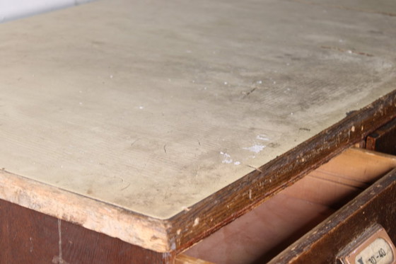 Image 1 of Antique industrial apothecary cabinet • Vintage wood and metal drawer cabinet with many compartments