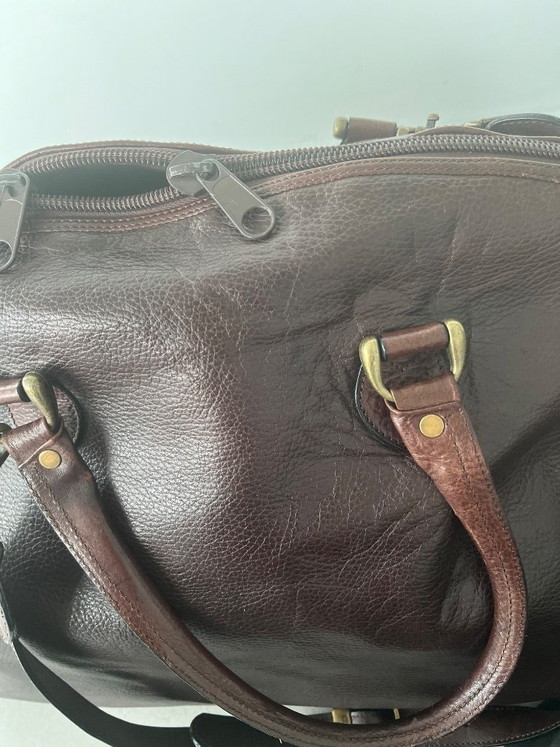 Image 1 of brown leather travel bag from Candy Corson leather atelier Amsterdam