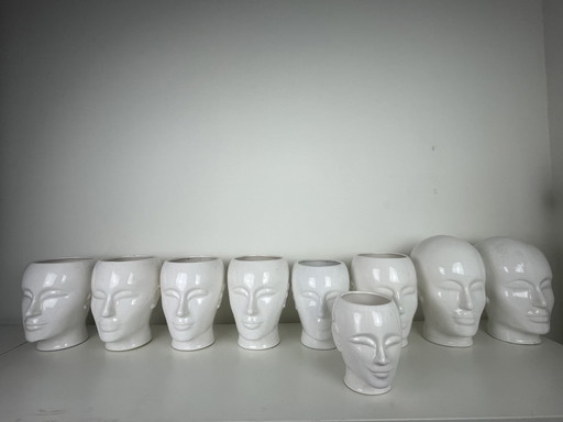 9 porcelain heads
