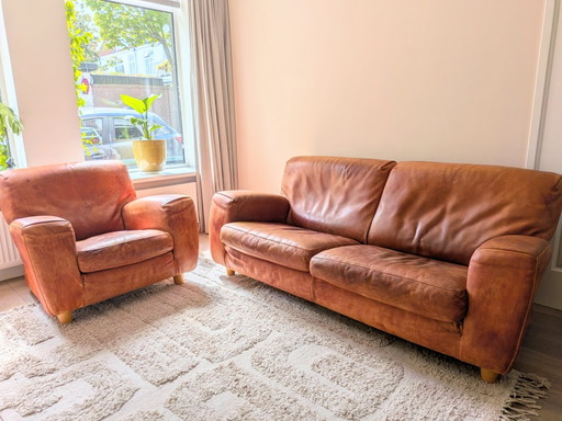 Set divano e poltrona in pelle Molinari, design italiano.