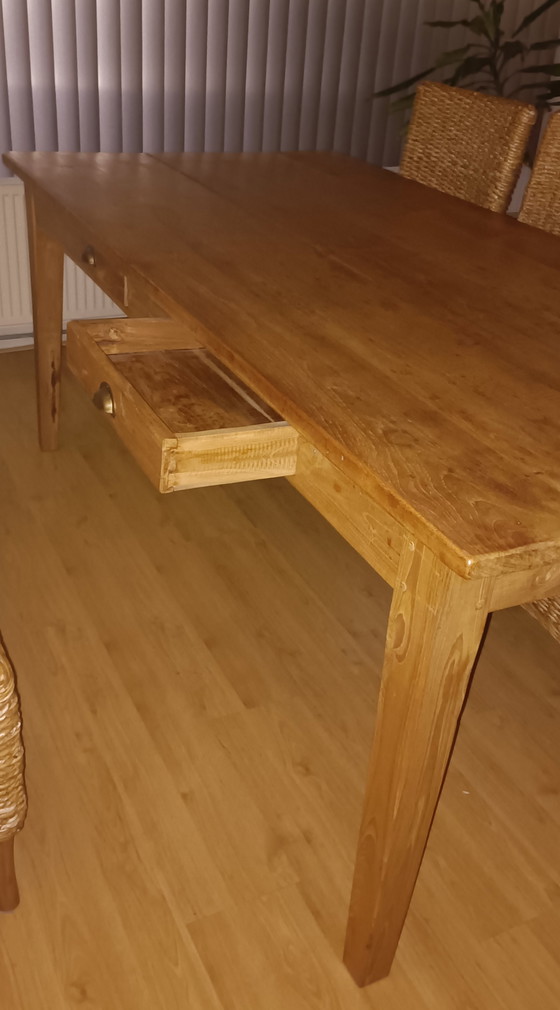 Image 1 of Tweedehands Eikenhouten eettafel en 6x Rotan stoelen 