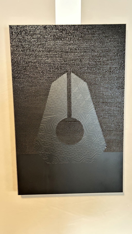 Rotan Hunt sculpture on carved mural
