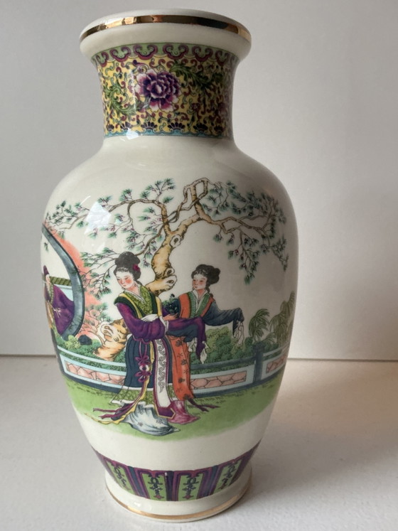 Image 1 of Porcelain vase decorated with a garden scene and figures