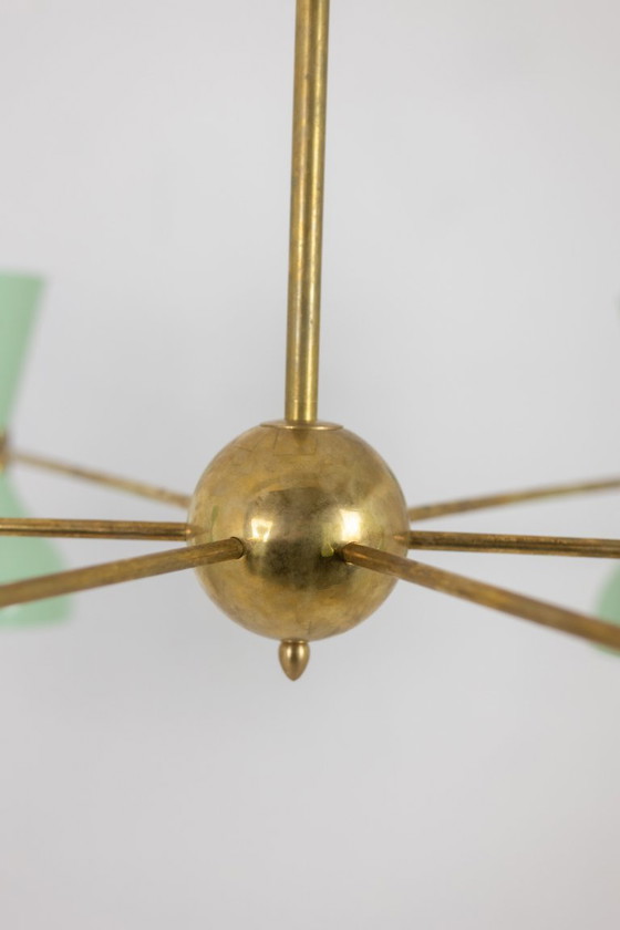 Image 1 of Lustre rayonnant de forme diabolo à 12 lumières. Contemporain.