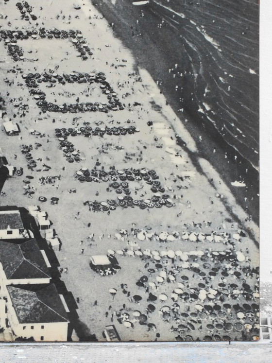 Image 1 of Cocacola umbrellas aerial photography Jesolo beach Italy years '60 by studio Ferruzzi Venice and Marco Lion photographer.