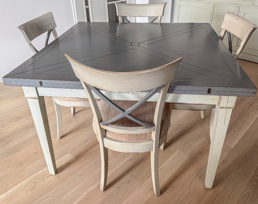 Handkerchief table with 4 leaves and 4 chairs