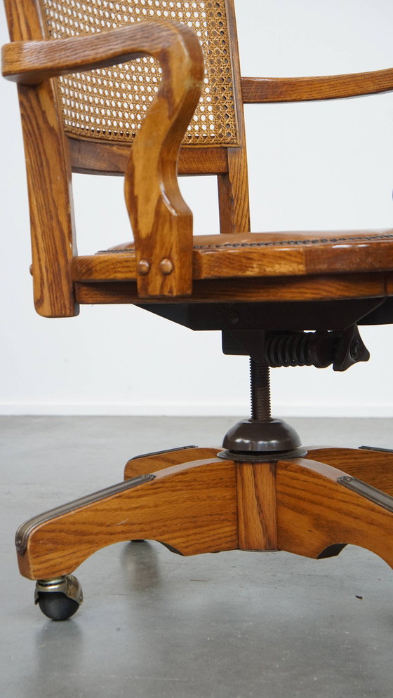 Image 1 of Cognac Colored Leather Office Chair on Wheels with Wood and a Wicker Matted Backrest