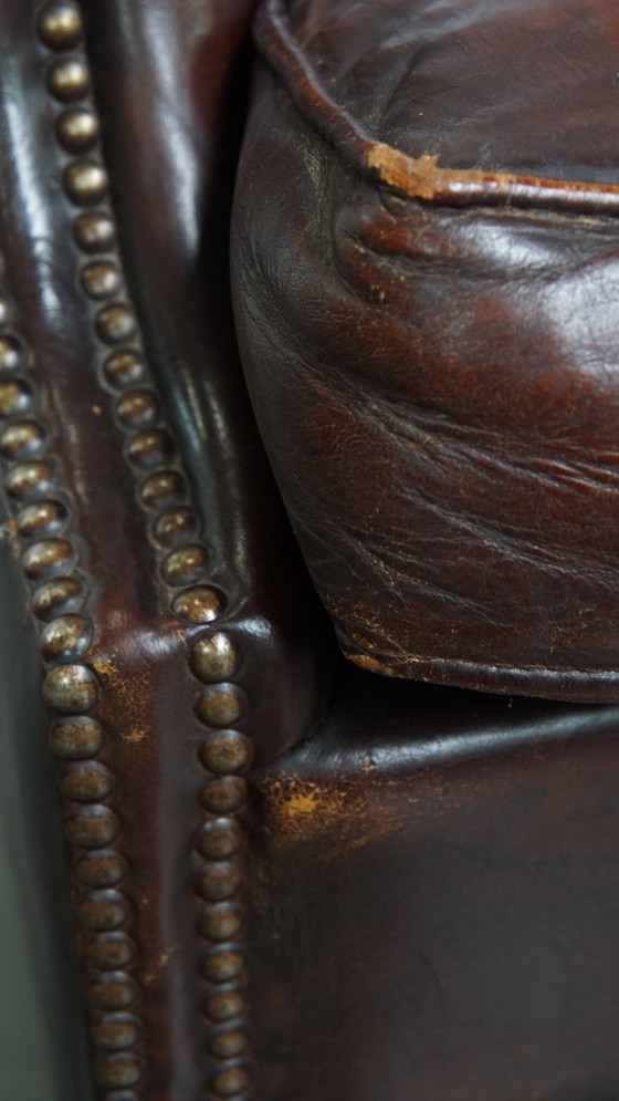 Image 1 of Donkere Engelse stijl schapenleren oorfauteuil