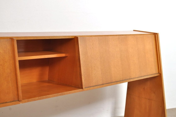 Mid-century sideboard with slanted front, 1950s – Wood (photo 5 of 13)
