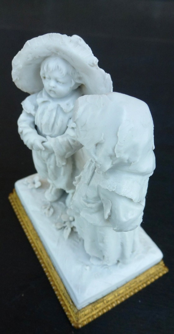 Image 1 of Luxury sponge porcelain figurine with gold leaf finish.