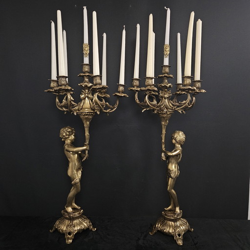 Large antique angel candlesticks