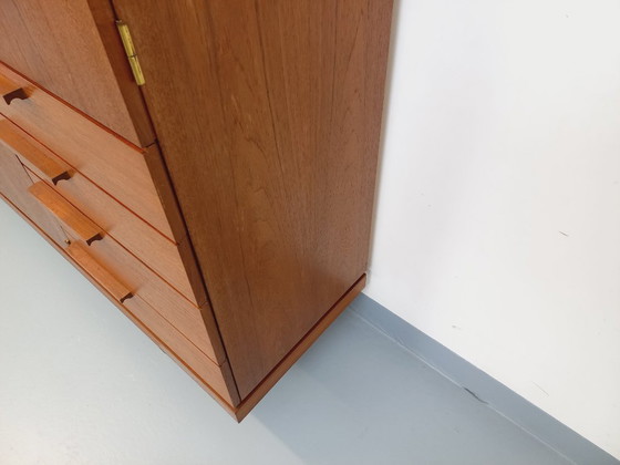 Image 1 of Tall, modernist, vintage Scandinavian sideboard in teak and black metal from the 1960s