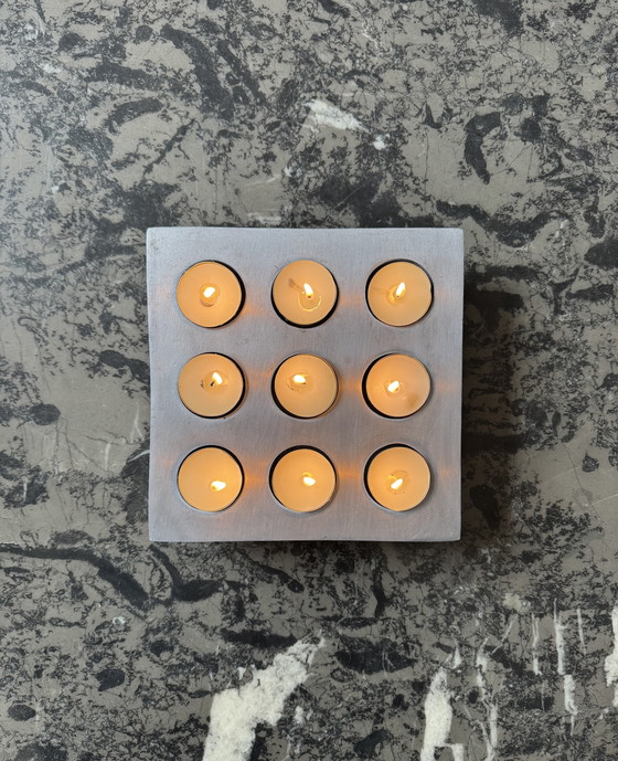 Image 1 of Brushed aluminum candle holder in a 1970s Scandinavian brutalist style