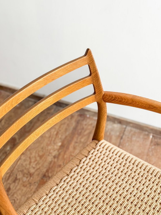 Image 1 of Esszimmerstuhl mit Armlehnen aus Eichenholz, Modell 62 für J.L. Moller