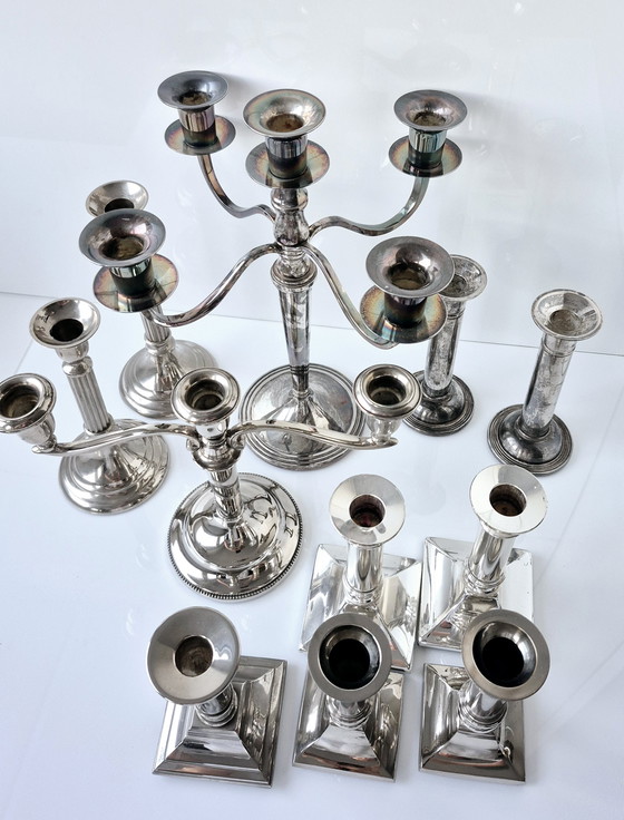 Image 1 of Collezione di 11 candelieri vintage placcati in argento (ottone) di varie epoche