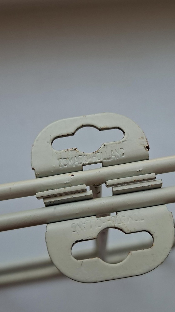 Image 1 of Raro estante de pared con la marca Tomado Holland