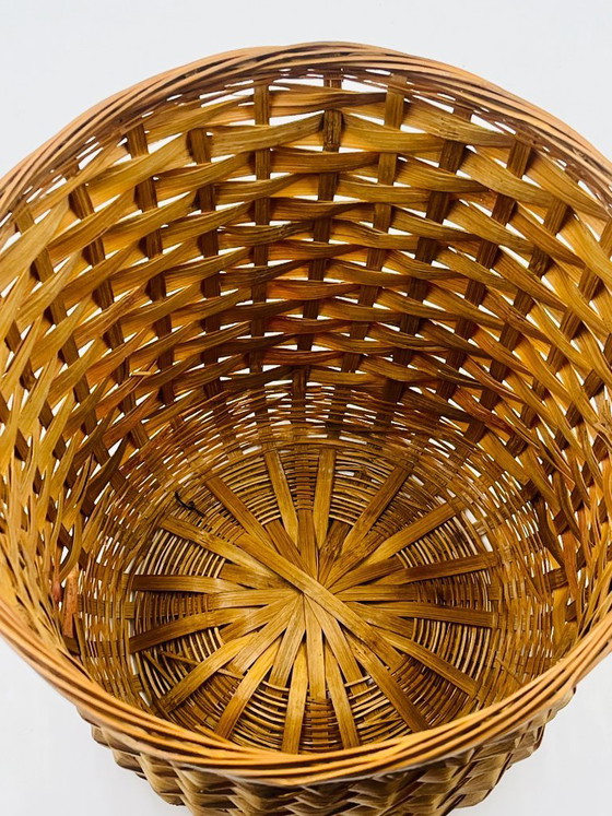 Image 1 of Cache pot vintage en osier tressé