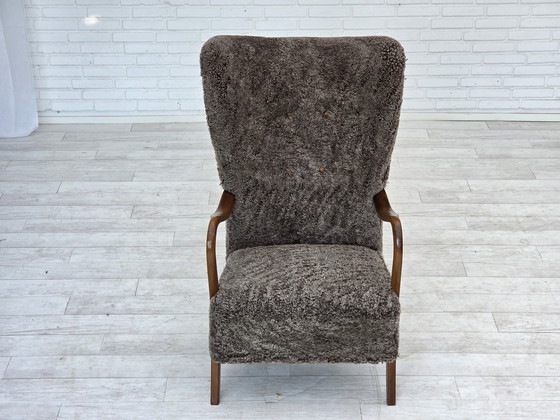 Image 1 of 1960s Reupholstered Danish Armchair with Stool, Genuine Sheepskin