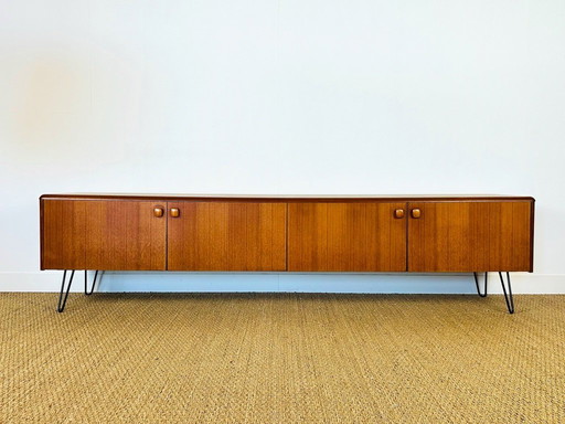 Low Scandinavian teak sideboard with 4 doors and hairpin metal legs, 1960