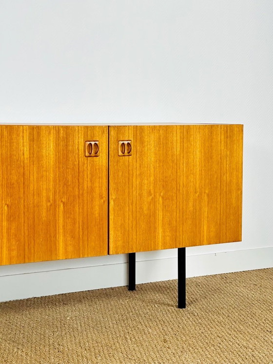 Image 1 of Minimalist Scandinavian sideboard in teak with black metal legs, 1960