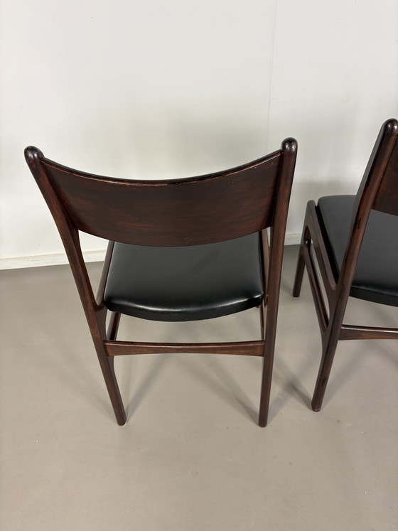 Image 1 of Set off 4 Vintage Palissander Wood With Black skai Leather dining chairs