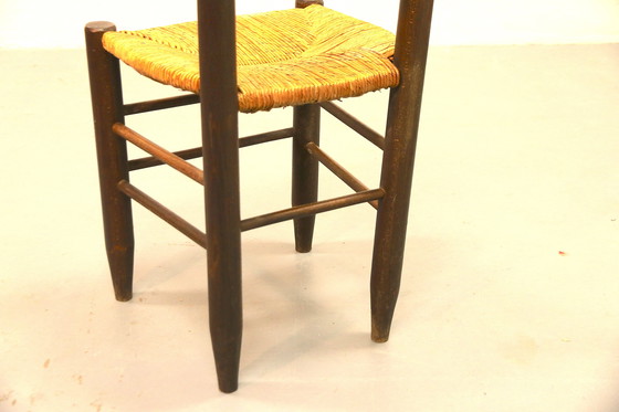 Image 1 of Juego de 8 (quizás 8) sillas Bauche No. 19 Charlotte Perriand