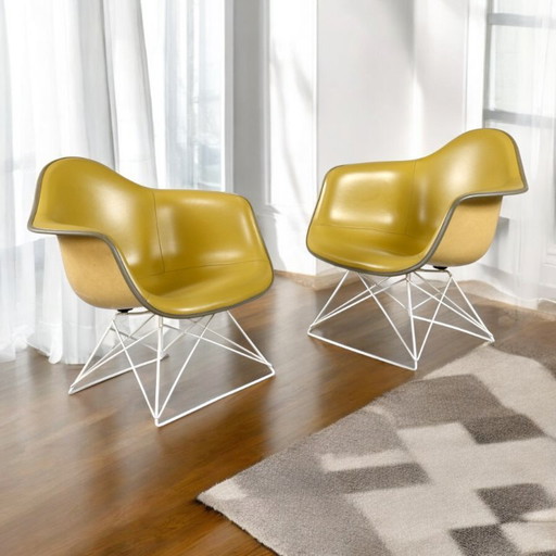 Pair of Eames for Herman Miller LAR Shell Chairs with Yellow Naugahyde Pads