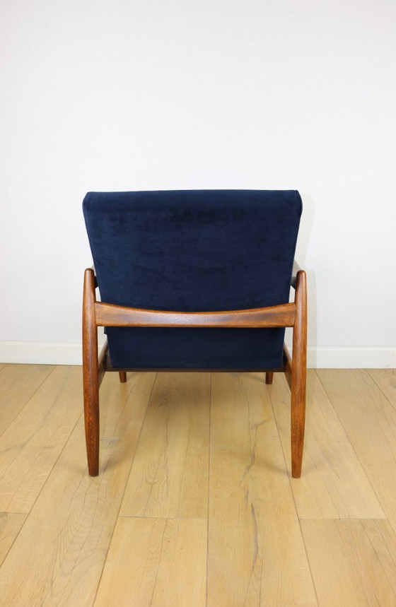 Image 1 of GFM-64 armchair, design by Edmund Homa from the 70s, navy blue - dark wood