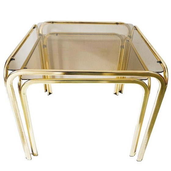 Image 1 of Ensemble de tables d'appoint vintage en laiton verre fumé Hollywood Regency