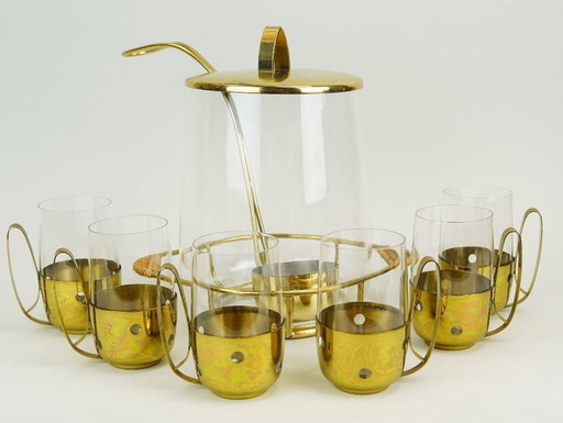 Élégant service à punch des années 1950, comprenant 6 verres et un centre de table.
