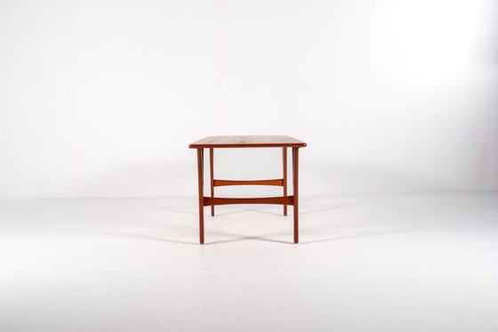 Image 1 of Grote Deense teakhouten salontafel, jaren 60