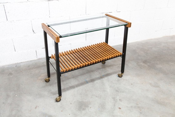 Image 1 of Serveerwagen uit de jaren 60, hifi-kast op wieltjes in teakhout, zwart metaal en glazen blad.