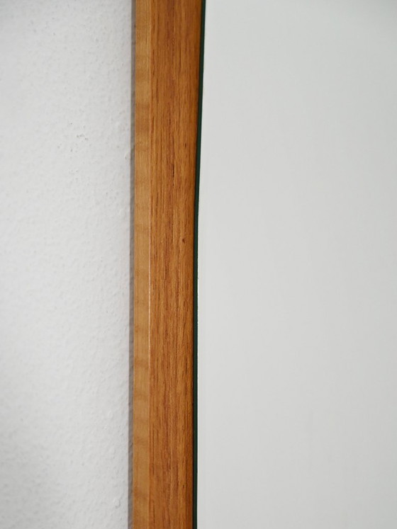 Image 1 of Scandinavisch gevormde teakhouten spiegel uit de jaren 60-70