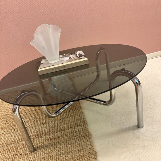 Image 1 of Curved tubular chrome coffee table with round glass top