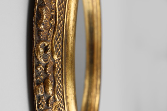 Image 1 of French Baroque Style Oval Mirror in Gilded Wood with Floral Decorations