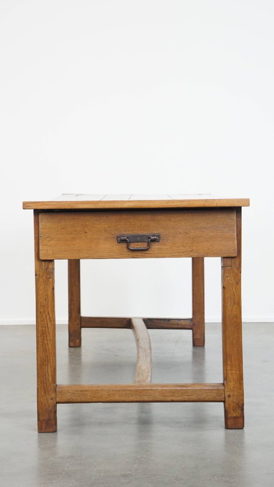 Image 1 of Large antique French farmhouse dining table made of fruitwood from the late 18th century with beautiful and original details.