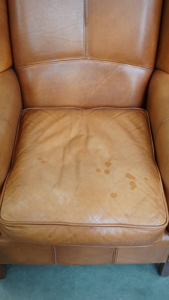 Image 1 of 2x Rundleren oorfauteuil afgewerkt met siernagels