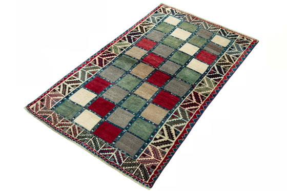 Image 1 of Handgeknüpfter Gabbeh Nomadenteppich – 183 x 107 cm – Farbige Karos & Tribal-Bordüre