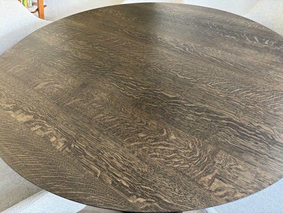 Image 1 of Round solid oak table with veneer top. Bought at Maison Manon.