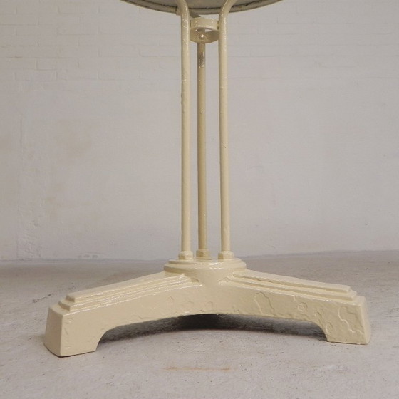 Bistro table with cast iron legs and round steel top, 1930s – Dining tables (photo 15 of 22)