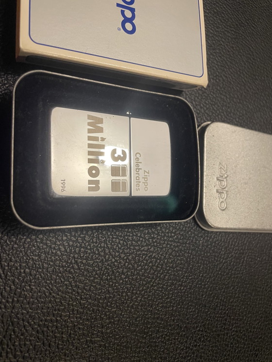 Image 1 of New Zippo lighter from 1996; 300 millionth lighter