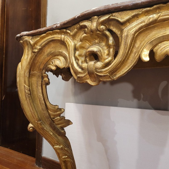 Image 1 of Consolle a muro, in legno intagliato e dorato, stile Luigi XV, XVIII secolo – Francia