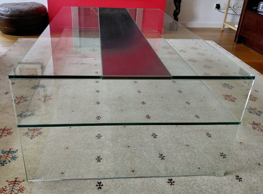 Tavolino da caffè in vetro trasparente con acciaio inossidabile al centro