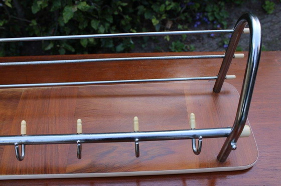 Image 1 of Vintage 60s/70s coat rack with chrome and wood