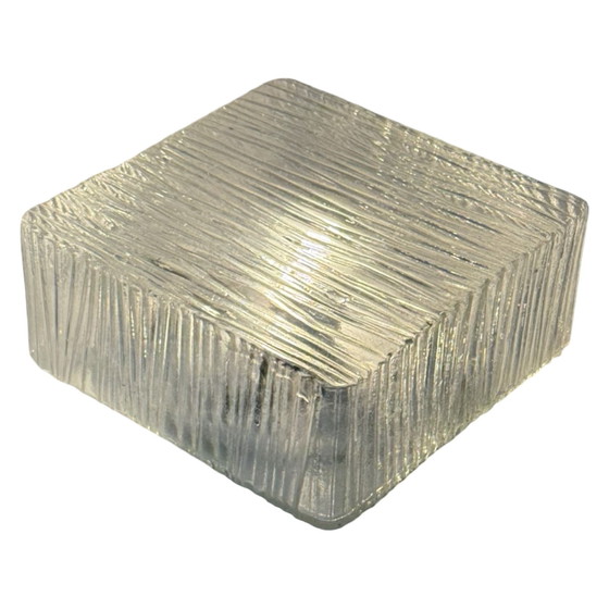 Image 1 of Art deco style lamp made from a metal base that houses an opaline dome. The dome is secured in place with a spring mechanism mak