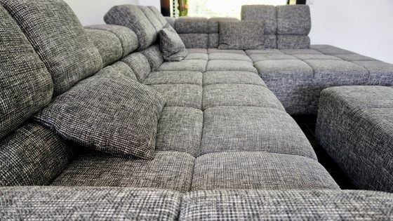 Image 1 of Moderne Grijze Hoekbank met Hocker - Comfortabel en Stijlvol