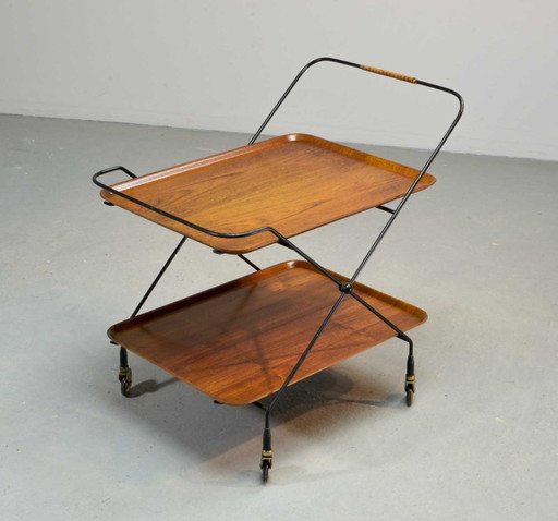 Poltrona Teatrolley minimalista e pieghevole in teak e acciaio di Paul Nagel. Germania, anni '50. 
